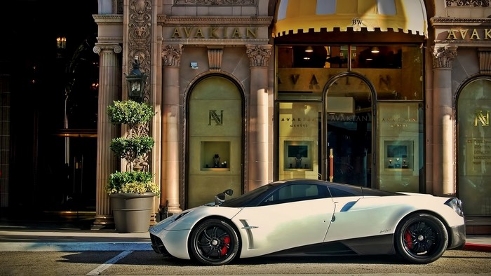 White Pagani Huayra parked in front of Avakian store