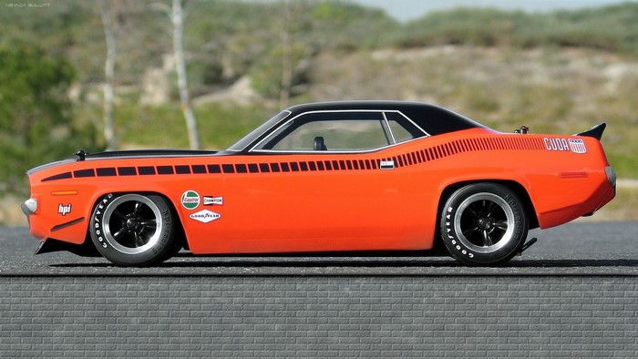 Orange Plymouth Barracuda with racing decals