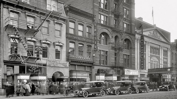 Early 20th Century American City Street with Metropolitan Theater