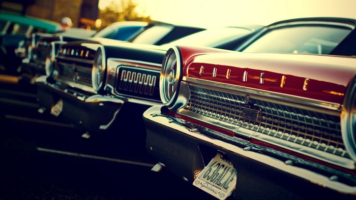 Close-up of vintage cars in a row