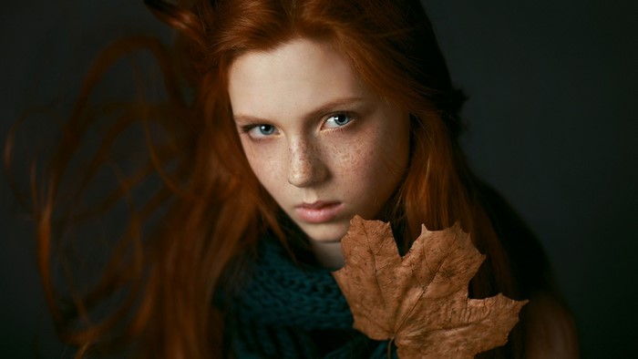 Girl with Freckles and Autumn Leaf