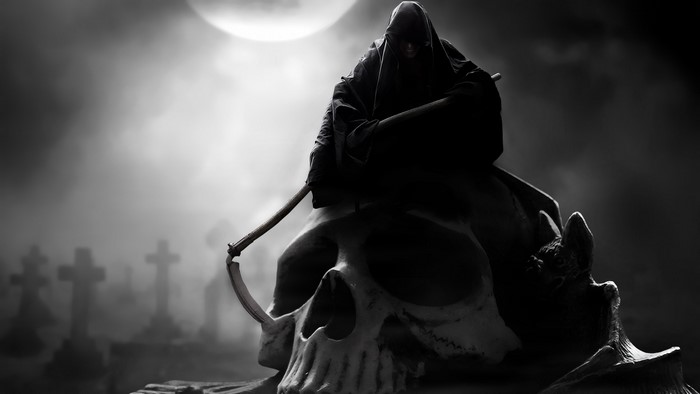 Grim Reaper sitting on a skull in a graveyard