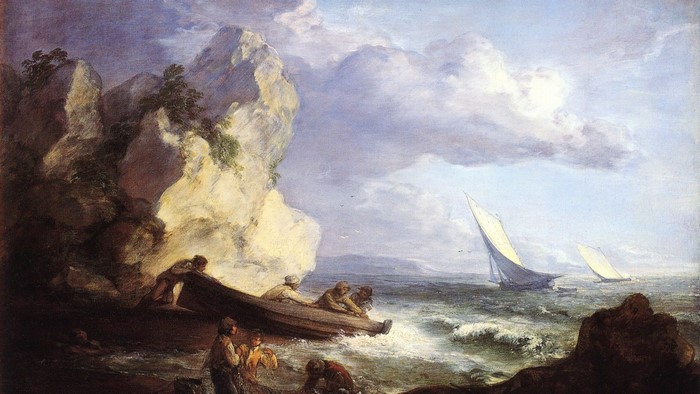 Fishermen launching a boat near a rocky shore with sailboats