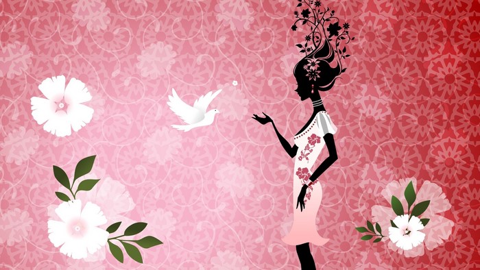 Silhouette of a woman with flowers in her hair and a dove