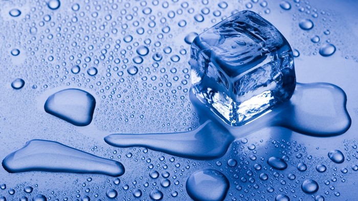Melting Ice Cube with Water Droplets