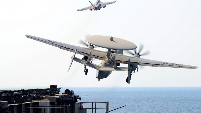 E-2C Hawkeye and F/A-18E Super Hornet launch at sea