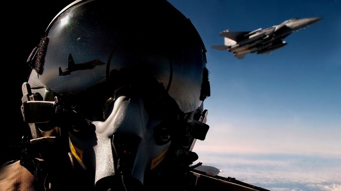 Fighter Jet Pilot in Helmet with Reflection