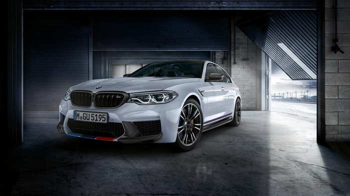 White BMW M5 with M Performance Parts