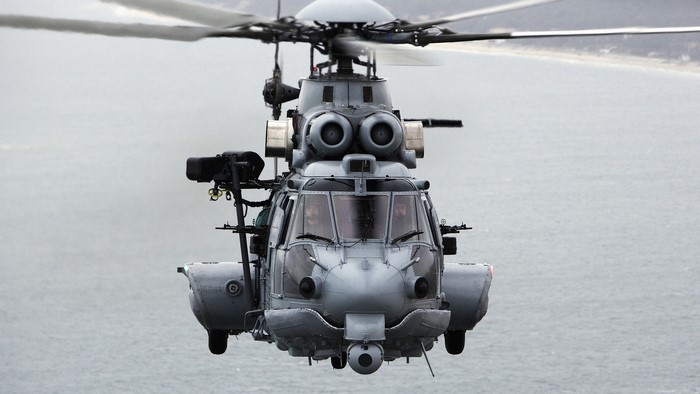 EC 725 Eurocopter helicopter flying over water