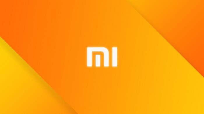 Xiaomi logo on orange and yellow background