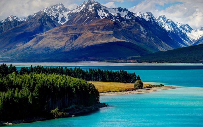 Turquoise lake and snow-capped mountains