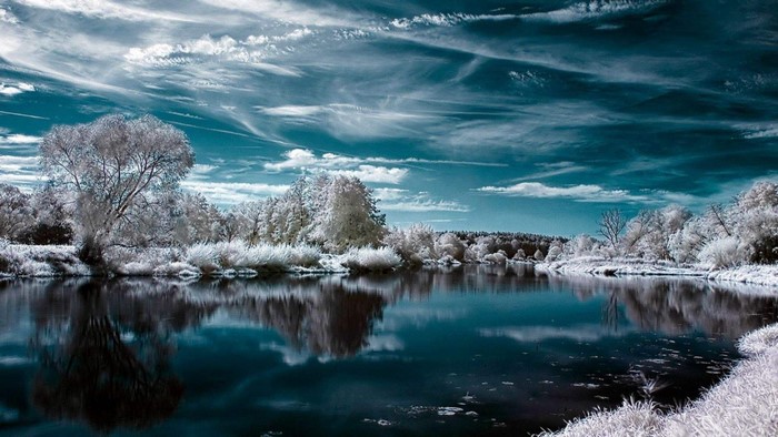 Infrared landscape with river and trees
