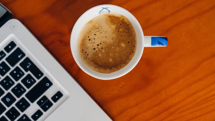 4K Coffee and Macintosh Laptop