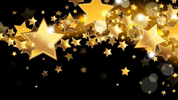 4K Golden Stars on Black Background