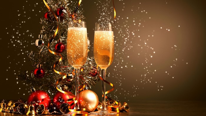 Champagne glasses with Christmas decorations