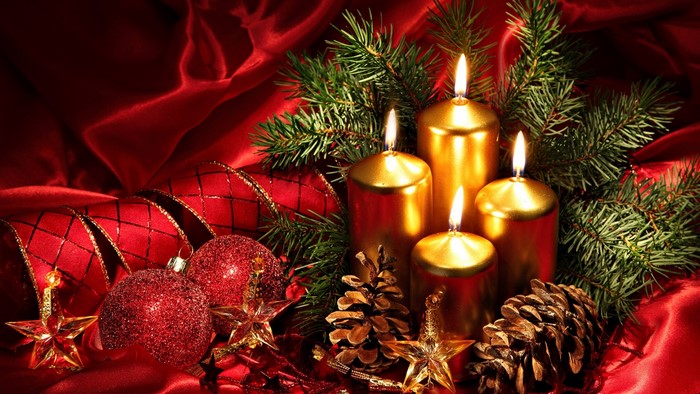 Christmas Candles and Ornaments on Red Silk
