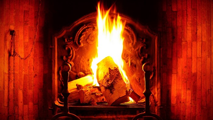 Fireplace with burning logs