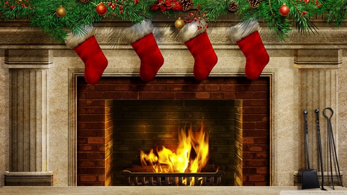 Christmas fireplace with stockings and fire