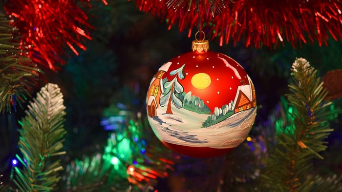 Christmas ornament with winter village scene