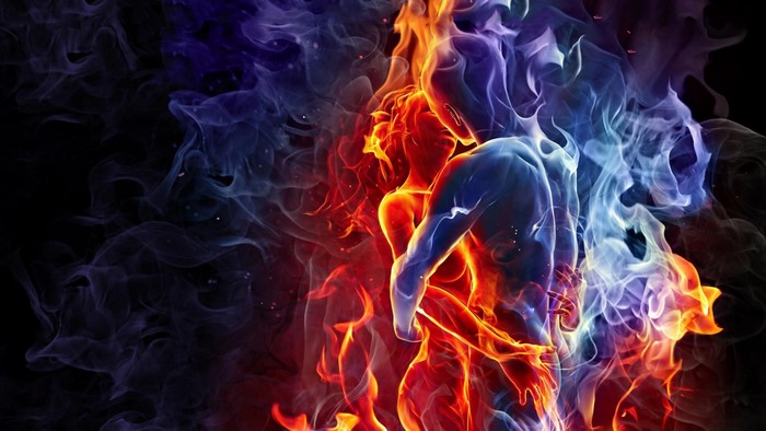 Romantic couple embraced by fire and smoke