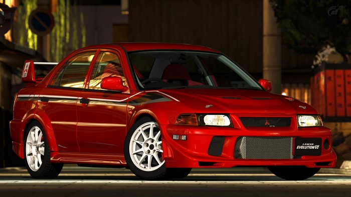 Red Mitsubishi Lancer Evolution VI Rally Car