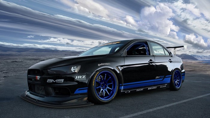 Black Mitsubishi Lancer Evolution X with Blue Accents