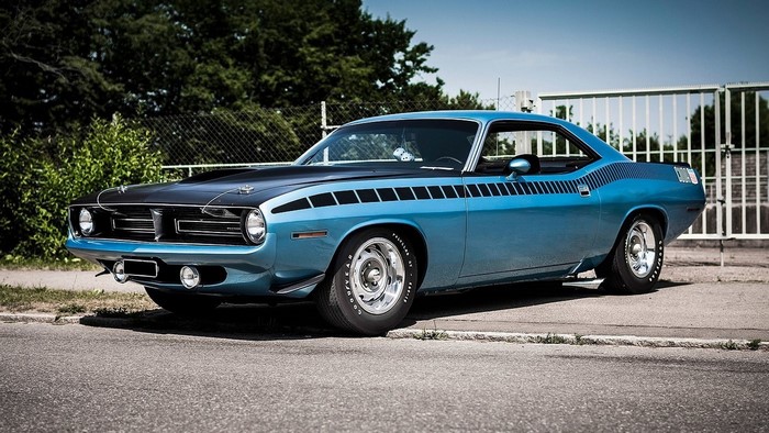 Blue Plymouth Barracuda parked on a street