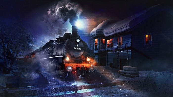 Steam train at night near a snowy house