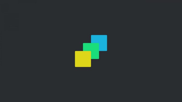 Three colored squares on dark background