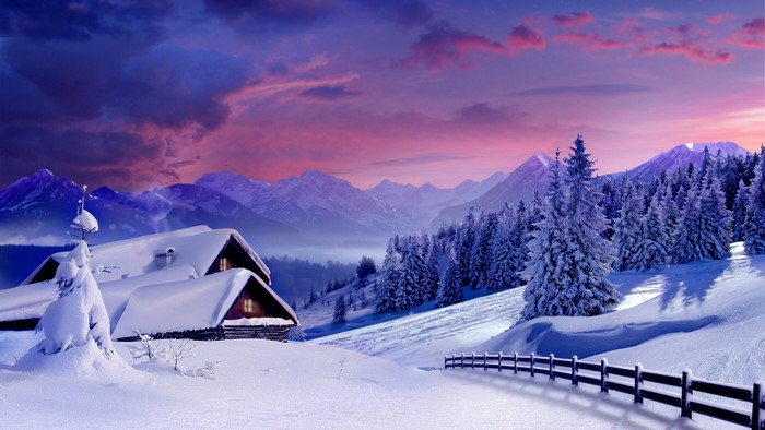 Snowy mountain landscape with cabins and pine trees