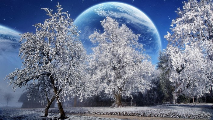 Winter landscape with frosted trees and a large planet