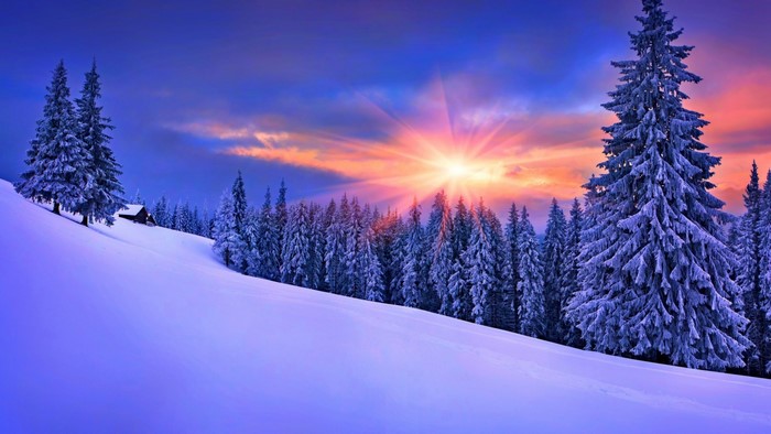 Winter mountain landscape with sunset