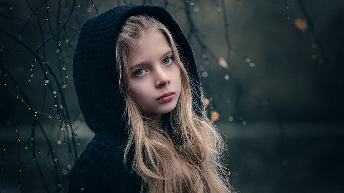 Girl in a dark hood