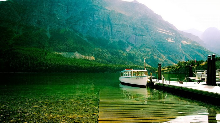 Boat docked on a mountain lake