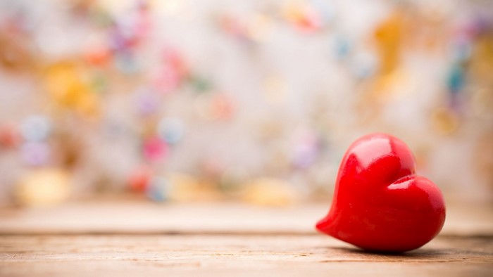 Red Heart on Blurred Colorful Background