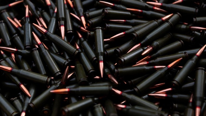 Pile of black bullets with copper tips