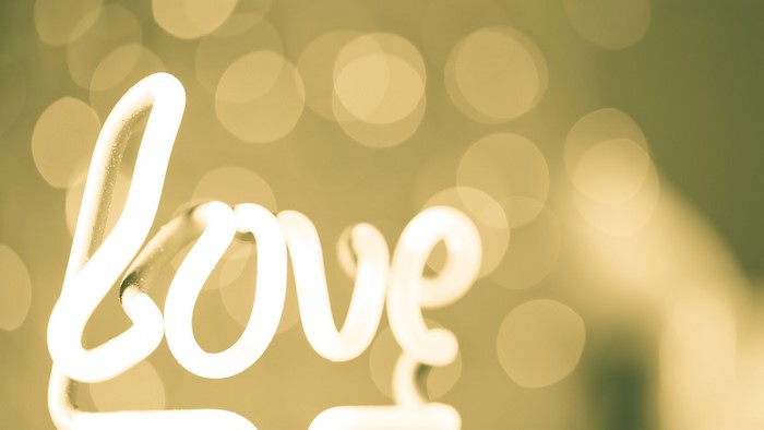 Neon Love Sign with Bokeh Lights