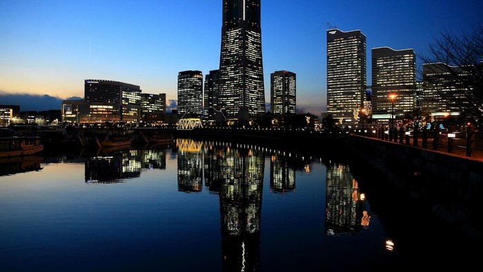 City of Yokohama skyline at dusk with reflections