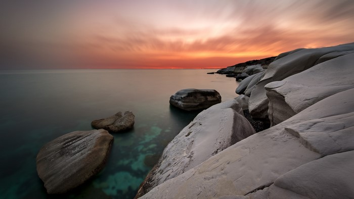 Coastal white rocks at sunset