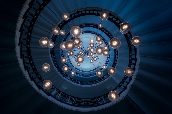 Spiral Staircase with Hanging Lights