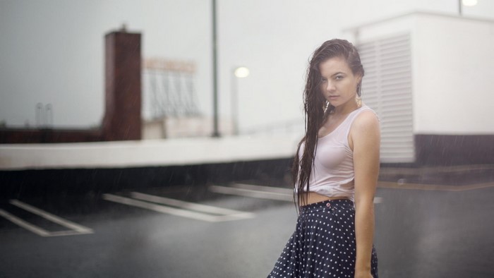Woman in polka dot skirt in the rain