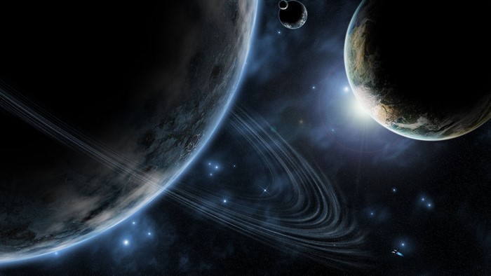 Planets with rings and moons in space