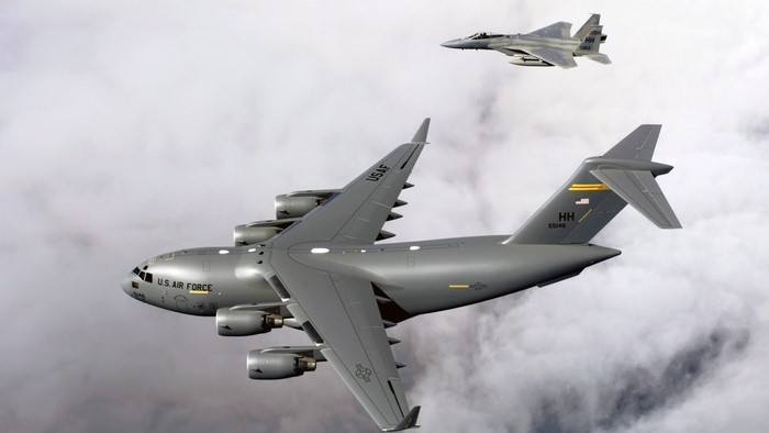 F-15 Eagle and C-17 Globemaster III in flight