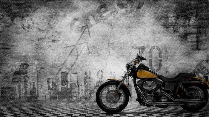 Yellow and black motorcycle on textured background