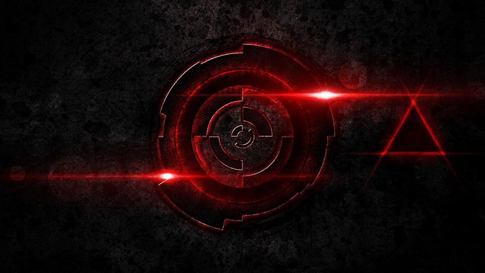 Red target symbol and triangle on dark background