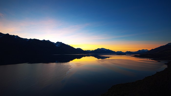 Lake and mountains at sunset