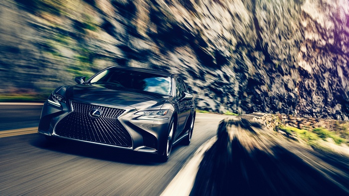 2018 Lexus LS 500h driving on a mountain road