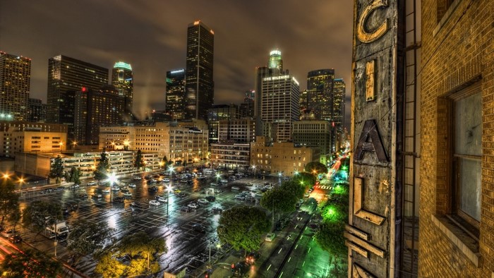 Los Angeles cityscape at night with wet streets
