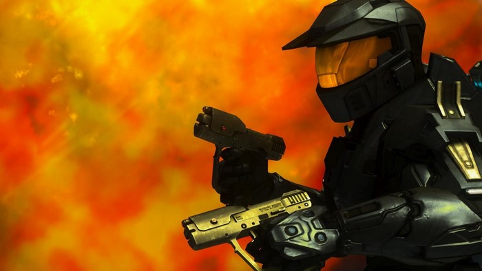 Master Chief from Halo holding two pistols