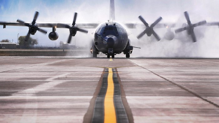Lockheed C-130 Hercules on a wet runway